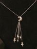Collana con pendente luna stelle diamanti/09